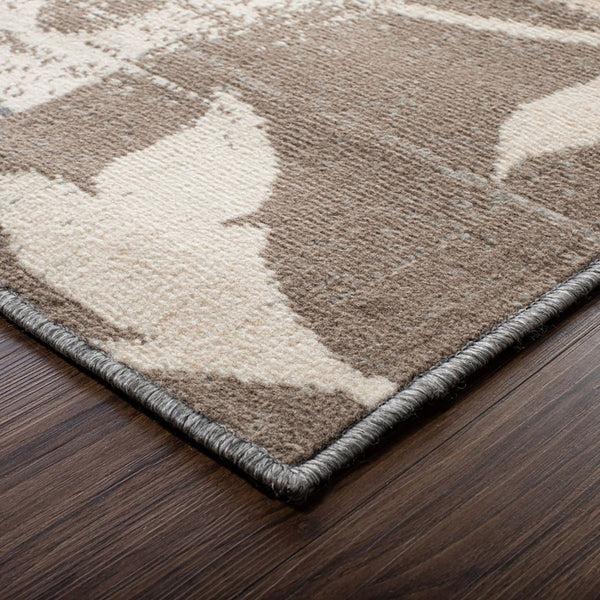 Homeroots 5' X 8' Brown And Ivory Floral Power Loom Distressed Stain Resistant Area Rug  Polypropylene 486999