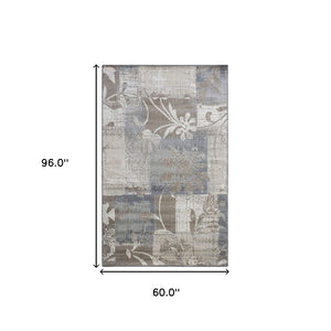 Homeroots 5' X 8' Brown And Ivory Floral Power Loom Distressed Stain Resistant Area Rug  Polypropylene 486999