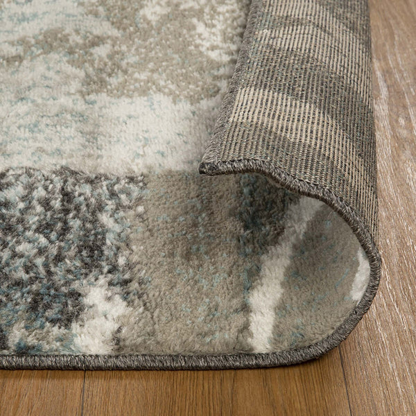 Homeroots 5' X 8' Teal Gray And Tan Floral Power Loom Distressed Stain Resistant Area Rug  Polypropylene 487000