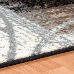 Homeroots 7' X 9' Beige And Gray Floral Power Loom Distressed Stain Resistant Area Rug  Polypropylene 487002