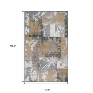 Homeroots 7' X 9' Beige And Gray Floral Power Loom Distressed Stain Resistant Area Rug  Polypropylene 487003