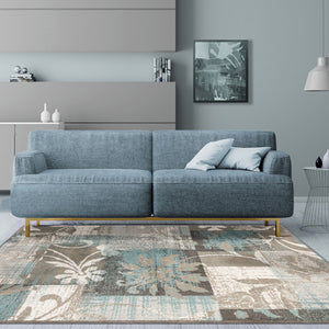 Homeroots 7' X 9' Teal Gray And Tan Floral Power Loom Distressed Stain Resistant Area Rug  Polypropylene 487004