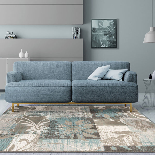 Homeroots 7' X 9' Teal Gray And Tan Floral Power Loom Distressed Stain Resistant Area Rug  Polypropylene 487004
