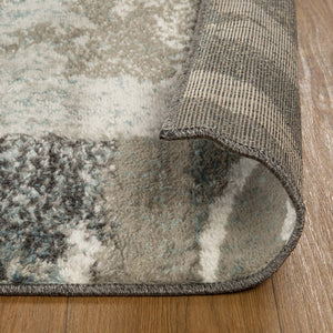 Homeroots 7' X 9' Teal Gray And Tan Floral Power Loom Distressed Stain Resistant Area Rug  Polypropylene 487004