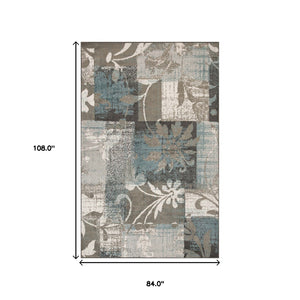 Homeroots 7' X 9' Teal Gray And Tan Floral Power Loom Distressed Stain Resistant Area Rug  Polypropylene 487004