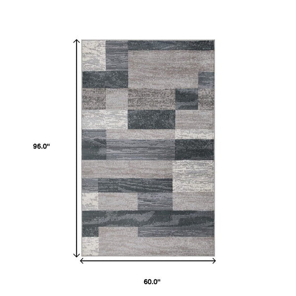 Homeroots 5' X 8' Blue And Taupe Patchwork Power Loom Stain Resistant Area Rug  Polypropylene 487091