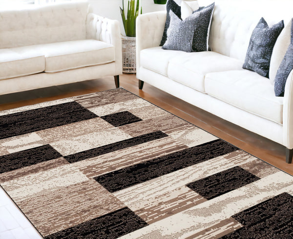 Homeroots 7' X 9' Chocolate Patchwork Power Loom Stain Resistant Area Rug  Polypropylene 487100