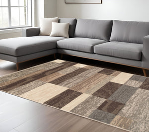 HomeRoots 7' Transitional Patchwork Area Rug in Beige, Slate Gray & Brown - Durable, Stylish & Stain-Resistant 7' X 9' 487105