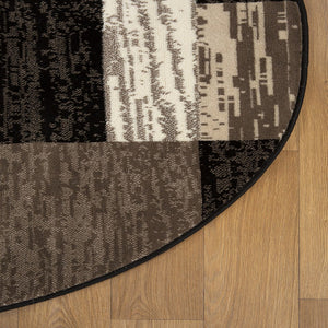 HomeRoots 7' Stylish Black, Brown & Beige Patchwork Area Rug - Durable, Stain-Resistant for High-Traffic Spaces 8' Round 487106