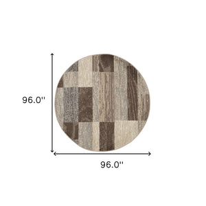 HomeRoots 7' Transitional Patchwork Area Rug in Beige, Slate Gray & Brown - Durable, Stylish & Stain-Resistant 8' Round 487107
