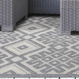 Homeroots 5' X 7' Cream Geometric Stain Resistant Non Skid Indoor Outdoor Area Rug  Polypropylene 487133