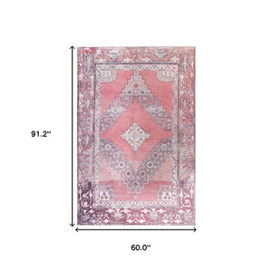 Homeroots 5' X 8' Pink Geometric Power Loom Distressed Stain Resistant Non Skid Area Rug  Polyester 487153