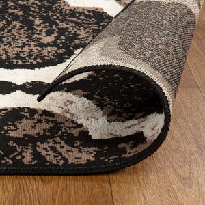 Homeroots 6' X 9' Chocolate Quatrefoil Power Loom Distressed Stain Resistant Area Rug  Polypropylene 487219