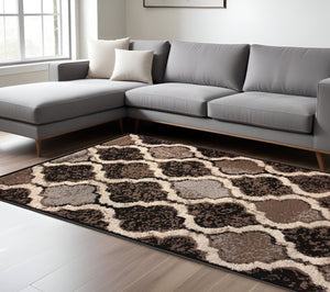 Homeroots 6' X 9' Chocolate Quatrefoil Power Loom Distressed Stain Resistant Area Rug  Polypropylene 487219
