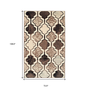 Homeroots 6' X 9' Ivory Quatrefoil Power Loom Distressed Stain Resistant Area Rug  Polypropylene 487222