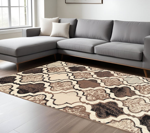 HomeRoots 7' Distressed Quatrefoil Area Rug in Ivory, Brown, and Black - Stylish, Durable, and Pet-Friendly Decor 9' X 12' 487244