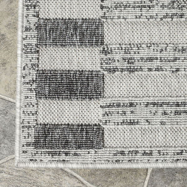 Homeroots 7' X 9' Grey Striped Stain Resistant Non Skid Indoor Outdoor Area Rug  Polypropylene 487256