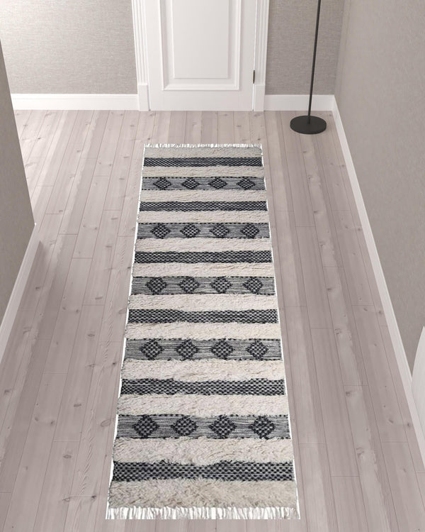 Homeroots 10' Black And Ivory Wool Striped Flatweave Handmade Stain Resistant Runner Rug With Fringe  Wool 487271