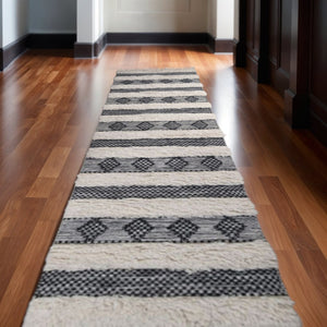 HomeRoots 10' Handmade Black and Ivory Wool Shag Flatweave Runner Rug with Fringed Ends for Stylish Spaces 10' Runner 487271