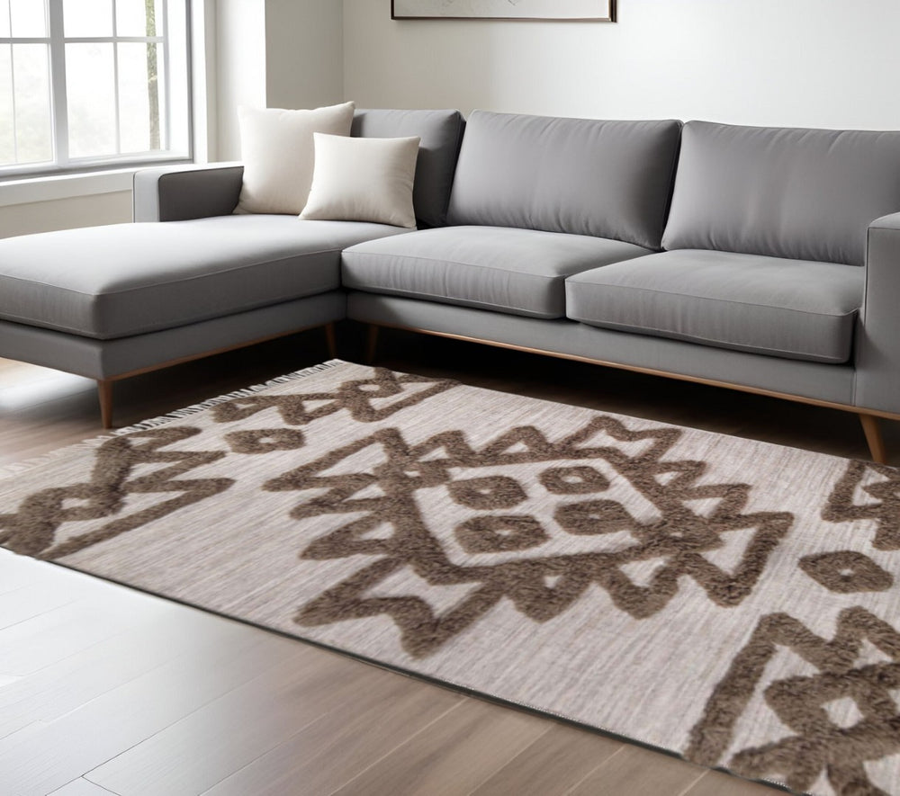 HomeRoots 8' Modern Geometric Sand and Brown Wool Shag Area Rug with Cozy Fringe for Stylish Living Spaces 8' X 10' 487301