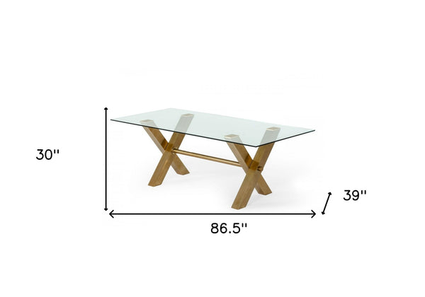 Homeroots 87" Clear And Gold Glass And Stainless Steel Sled Base Dining Table   487359