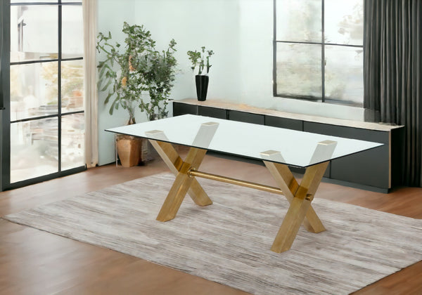 Homeroots 87" Clear And Gold Glass And Stainless Steel Sled Base Dining Table   487359