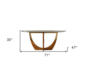 Homeroots 71" Clear And Gold Oval Glass And Stainless Steel Dining Table   487366