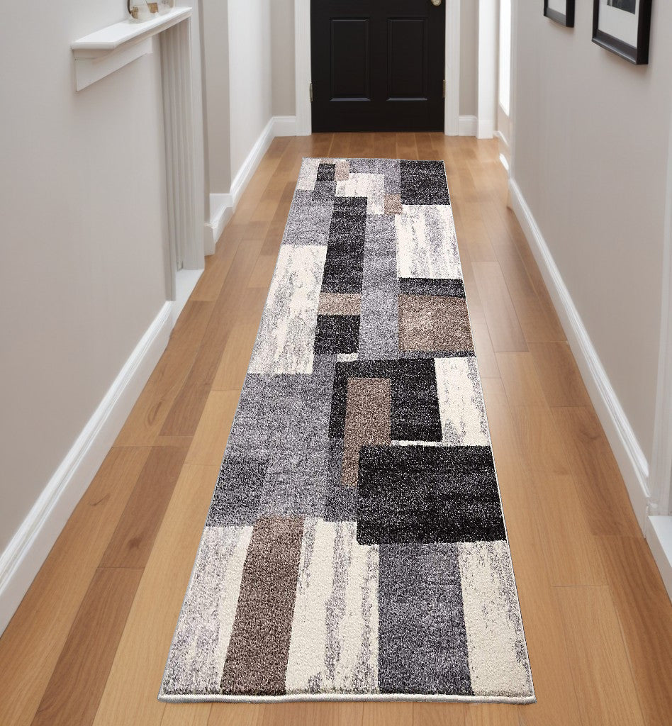 Homeroots 2' X 8' Brown Geometric Power Loom Stain Resistant Area Rug  Polyester 487549