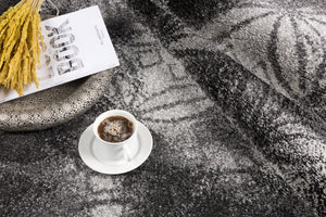 Homeroots 4' X 6' Black Abstract Power Loom Stain Resistant Area Rug  Polyester 487554