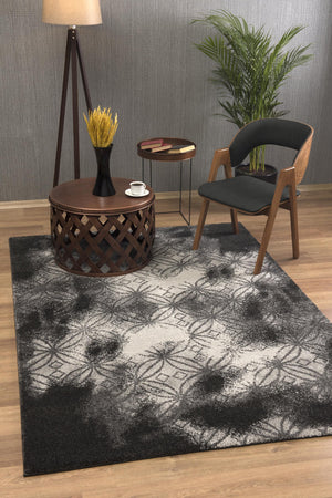 Homeroots 8' X 11' Black Abstract Power Loom Stain Resistant Area Rug  Polyester 487555
