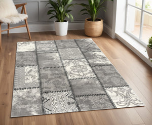 HomeRoots 4' Gray and Ivory Damask Area Rug - Timeless Elegance, Machine Washable, Durable for High-Traffic Areas 4' X 6' 487579