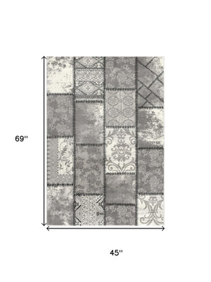 HomeRoots 4' Gray and Ivory Damask Area Rug - Timeless Elegance, Machine Washable, Durable for High-Traffic Areas 4' X 6' 487579