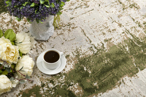 Homeroots 10' Green And Ivory Abstract Power Loom Distressed Runner Rug  Polypropylene 487582