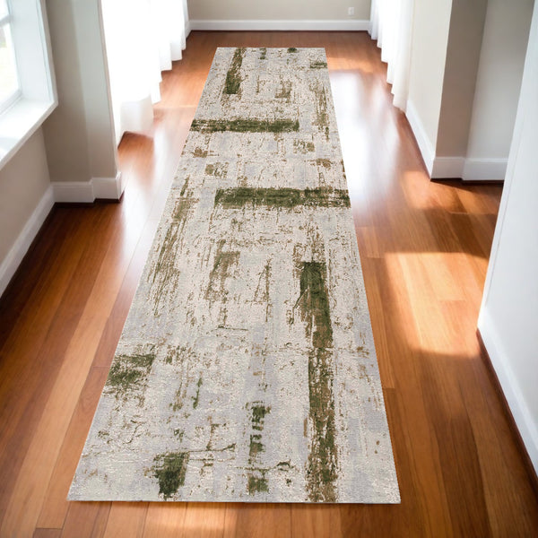 Homeroots 15' Green And Ivory Abstract Power Loom Distressed Runner Rug  Polypropylene 487584
