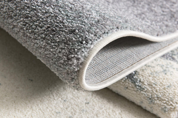 Homeroots 2' X 20' White And Blue Abstract Power Loom Stain Resistant Area Rug  Polyester 487597