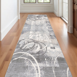 Homeroots 10' Gray And Ivory Abstract Power Loom Distressed Runner Rug  Polyester 487615