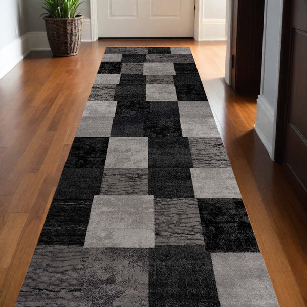 Homeroots 10' Gray And Black Geometric Power Loom Distressed Runner Rug  Olefin 487632