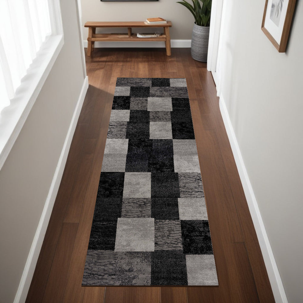 Homeroots 8' Gray And Black Geometric Power Loom Distressed Runner Rug  Olefin 487636