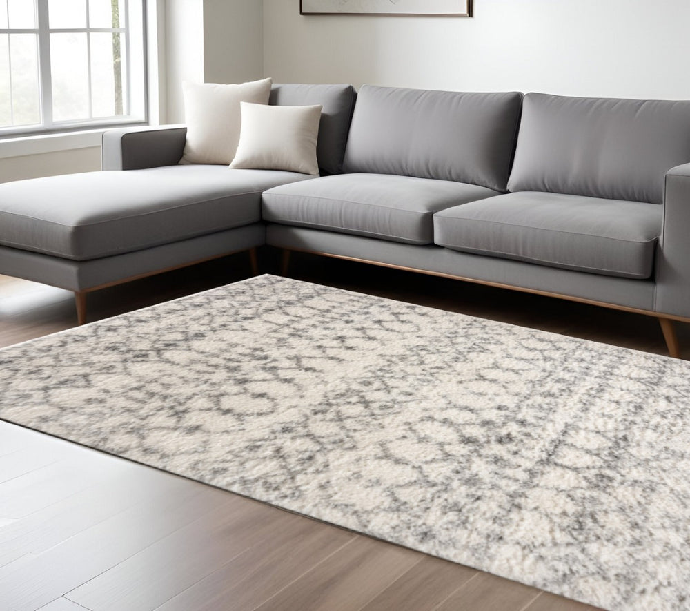 HomeRoots 5' Plush Gray and Ivory Southwestern Shag Area Rug – Cozy, Durable Design for Any Room Decor 7' X 9' 487659