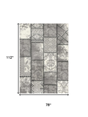 HomeRoots 4' Gray and Ivory Damask Area Rug - Timeless Elegance, Machine Washable, Durable for High-Traffic Areas 7' X 9' 487661
