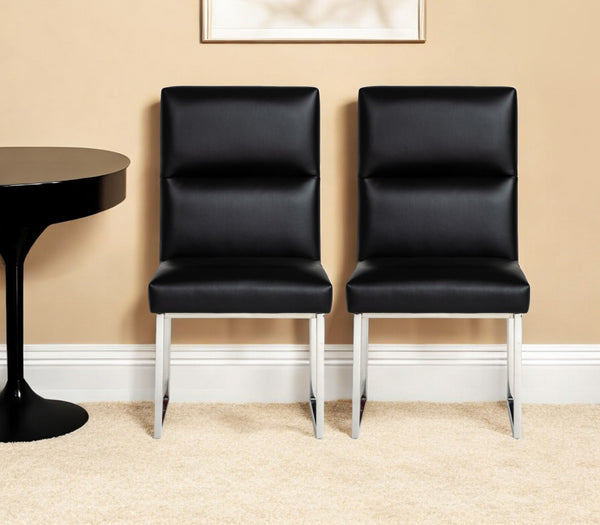 Homeroots Set Of Two Tufted Black And Silver Upholstered Faux Leather Dining Side Chairs  Metal And Wood 487965