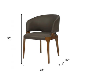 Homeroots Dark Gray And Brown Upholstered Faux Leather Wing Back Dining Arm Chair  Wood 488005