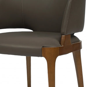 Homeroots Dark Gray And Brown Upholstered Faux Leather Wing Back Dining Arm Chair  Wood 488005