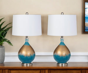 HomeRoots Set of Two 27" Ombre Blue and Gold Glass Table Lamps with Elegant White Shades for Any Room 488344