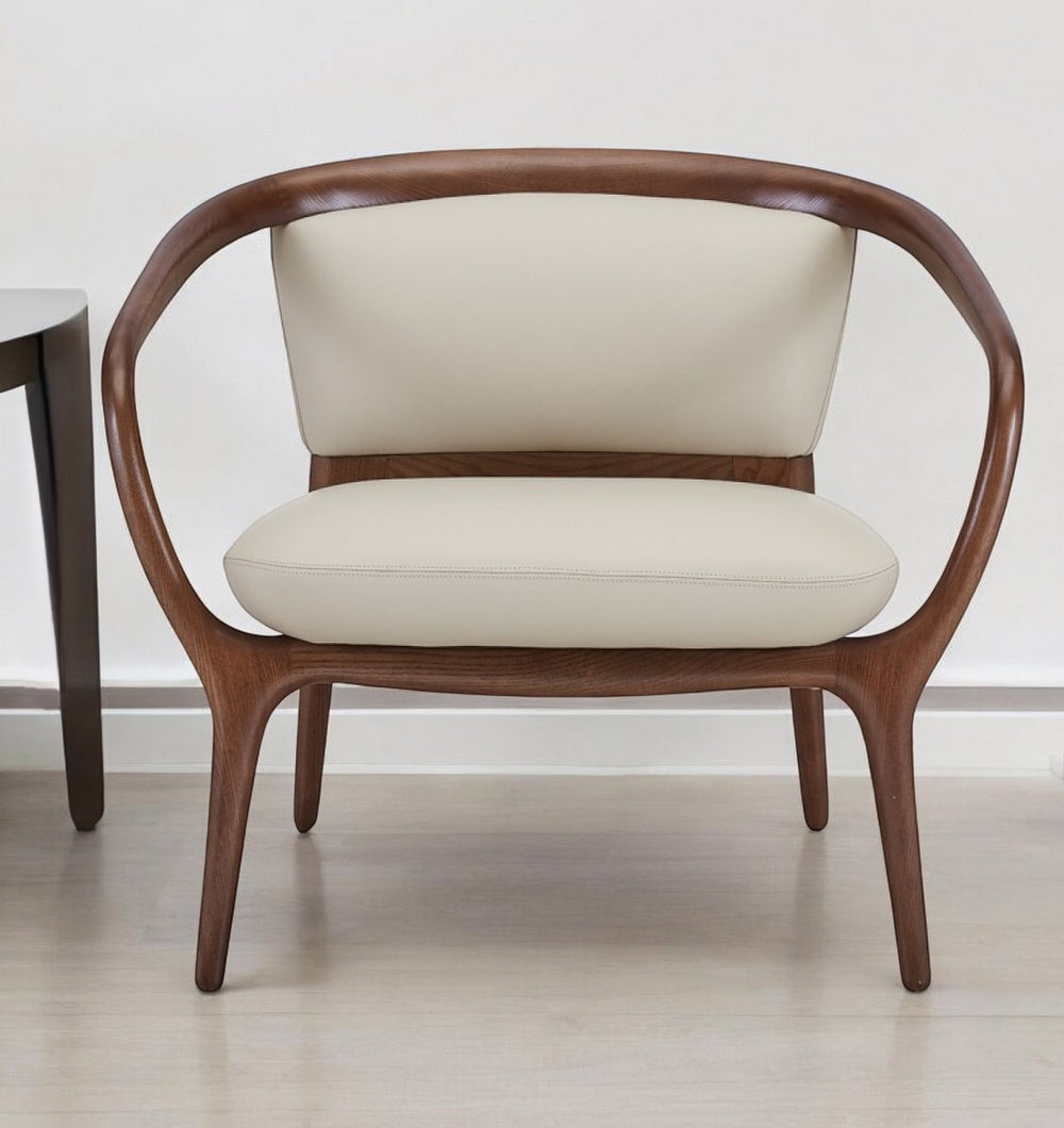 Homeroots 30" Beige Faux Leather And Walnut Solid Color Lounge Chair   488441