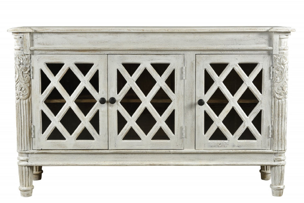 HomeRoots 58" Elegant White Distressed Solid Wood Sideboard with Glass Doors & Carved Scrollwork for Storage 488487