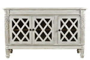 HomeRoots 58" Elegant White Distressed Solid Wood Sideboard with Glass Doors & Carved Scrollwork for Storage 488487