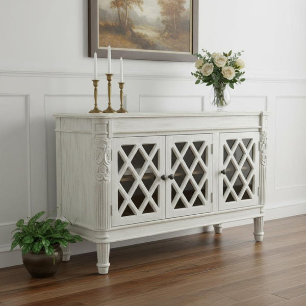 HomeRoots 58" Elegant White Distressed Solid Wood Sideboard with Glass Doors & Carved Scrollwork for Storage 488487