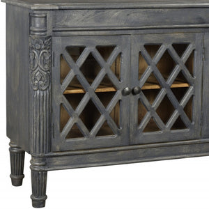 HomeRoots 58" Dark Gray Carved Scrollwork Sideboard with Glass Doors - Elegant Storage for Any Space 488488