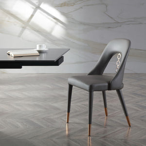 Homeroots Set Of Two Gray Faux Leather Dining Side Chairs With Rose Gold Accents  Metal 488511